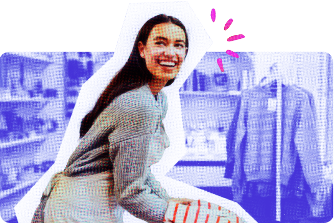 Woman smiling in her store because she business insurance